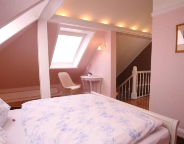 Villa Caldera Cuxhaven Juniorsuite Schlafzimmer